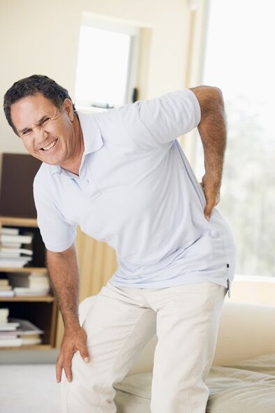 man with back pain in the lumbar region